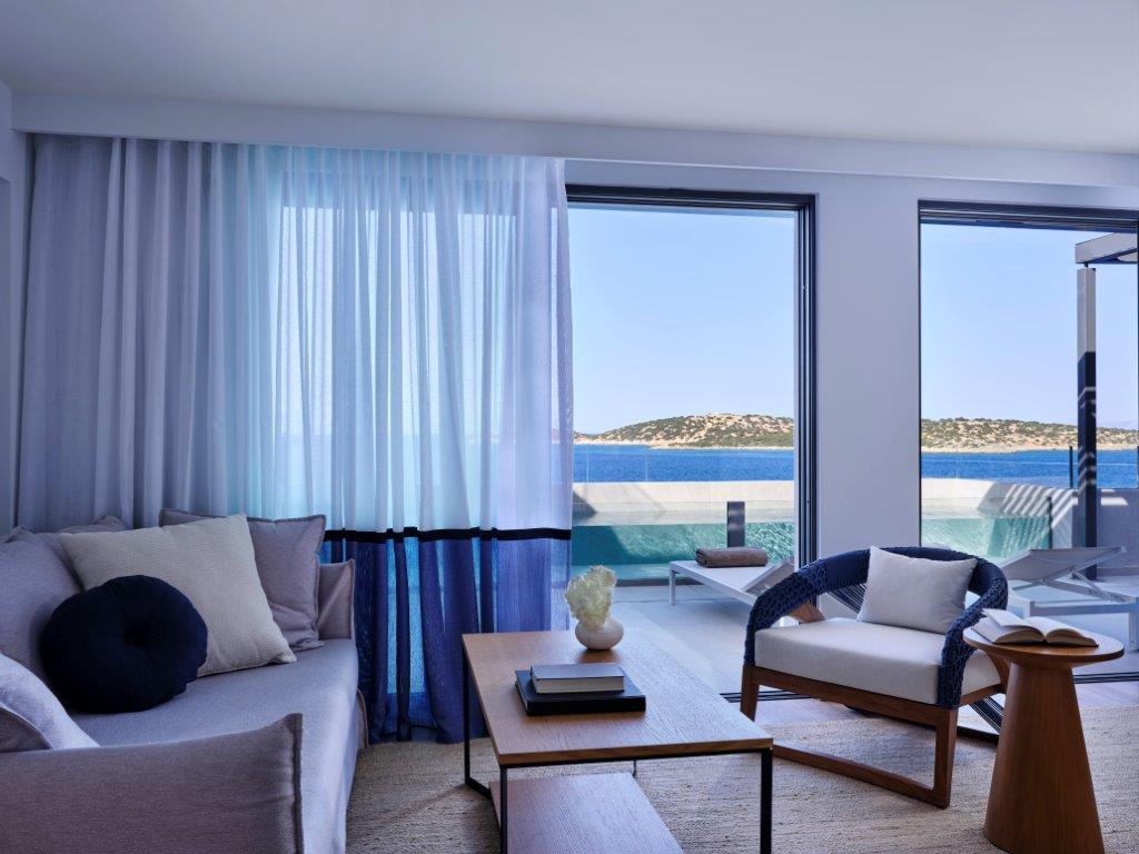 One-Bedroom Suite Living Area and Sea Balcony