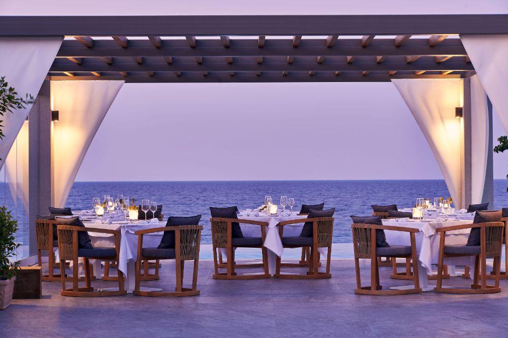 Award-Winning Melia Fine Dining Restaurant Framing Sunset Vistas Over the Ionian Sea