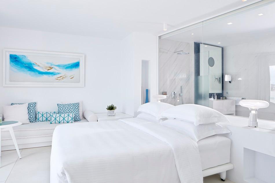 Azure Suite with Open-Plan Living, Private Outdoor Terrace, and Heated Jacuzzi