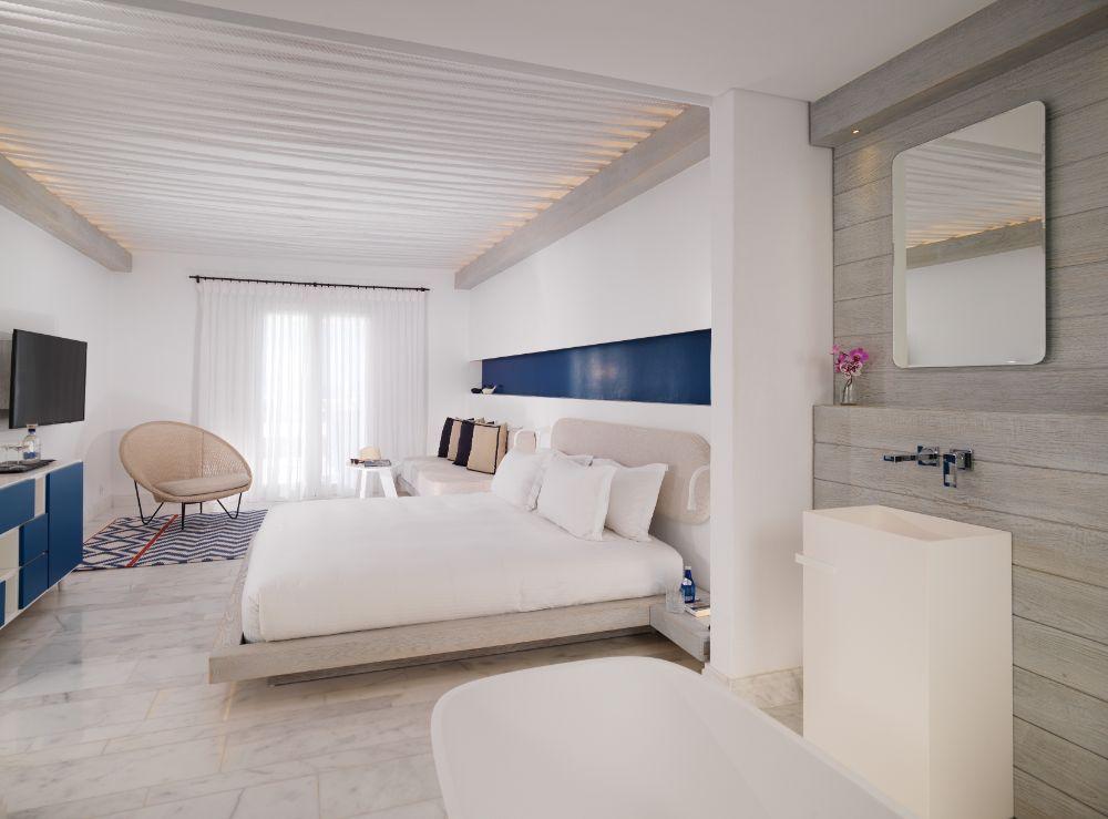Ambio Retreat Bedroom and Private Outdoor Heated Jacuzzi Terrace Framing Sea Views