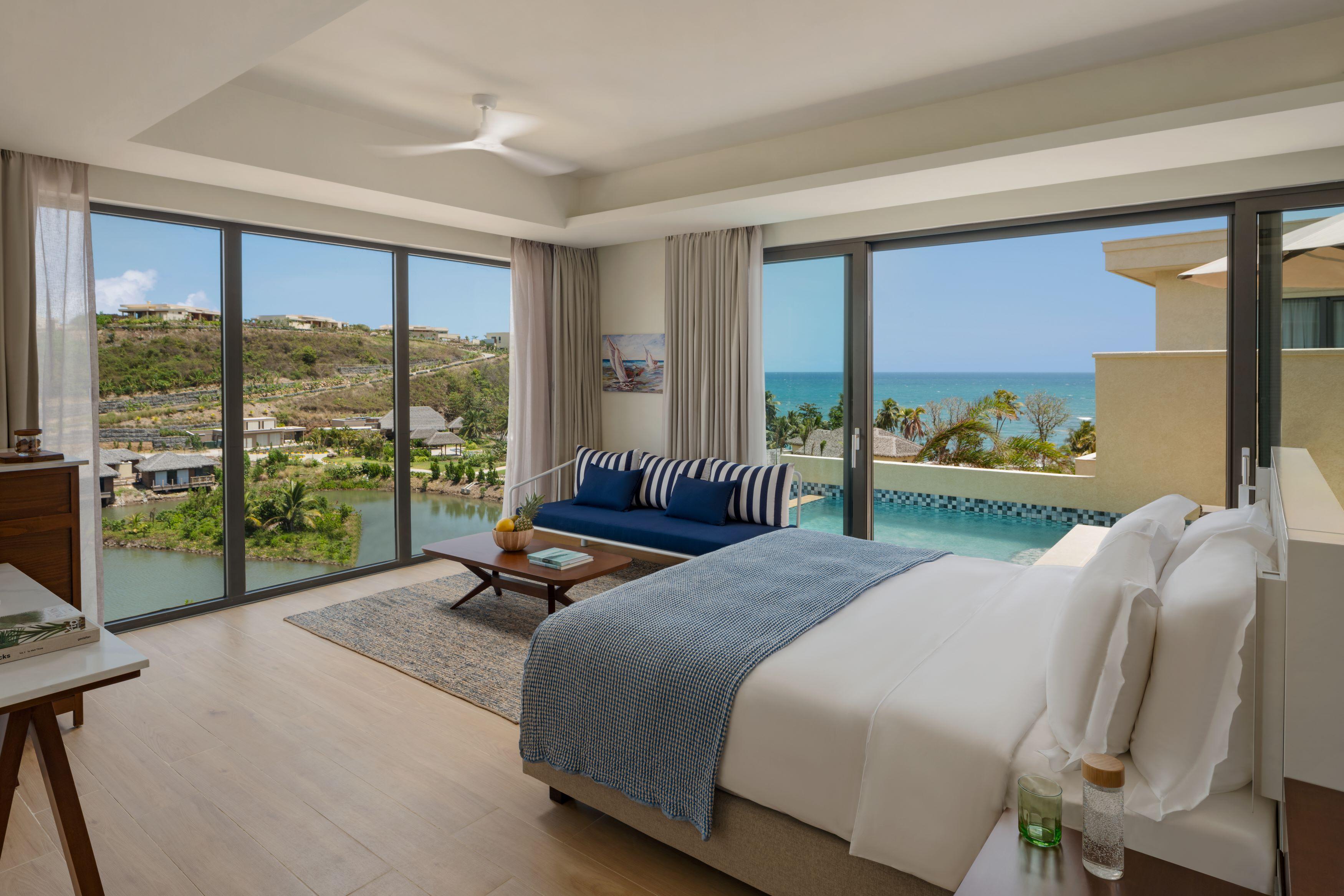 Ocean View Pool Suite bedroom with natural organic linens