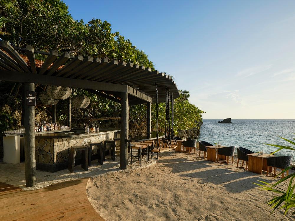 The Drop Off specialty beach bar on the scenic Iron Shore serving handcrafted sunset cocktails