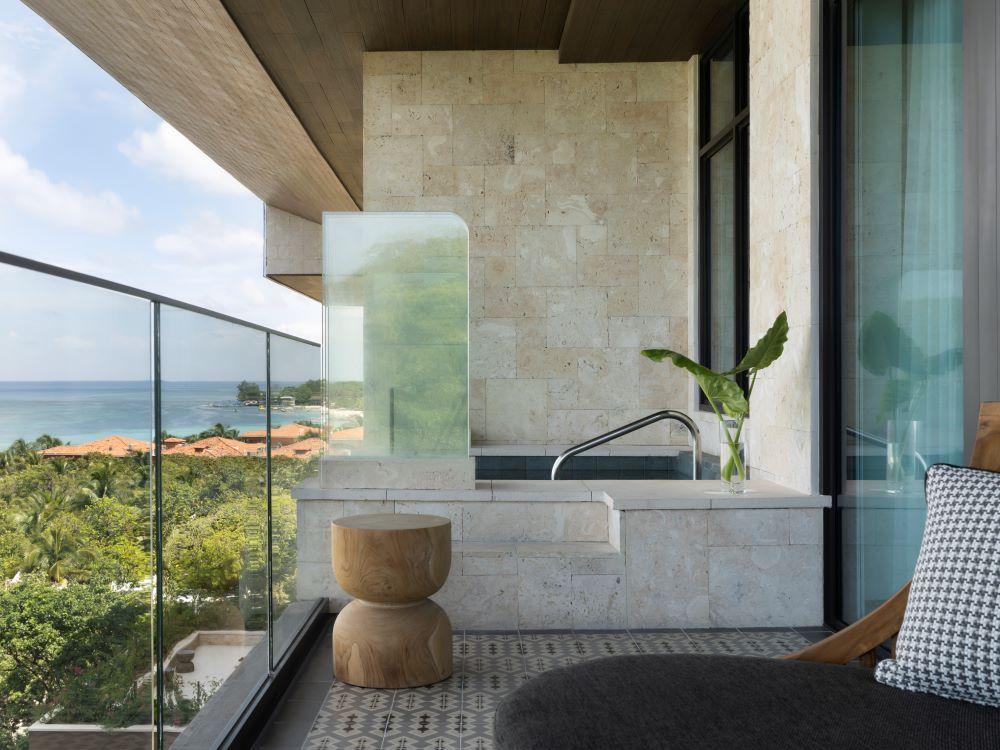 Roatan Suite private plunge pool terrace with sweeping views of the turquoise Caribbean ocean
