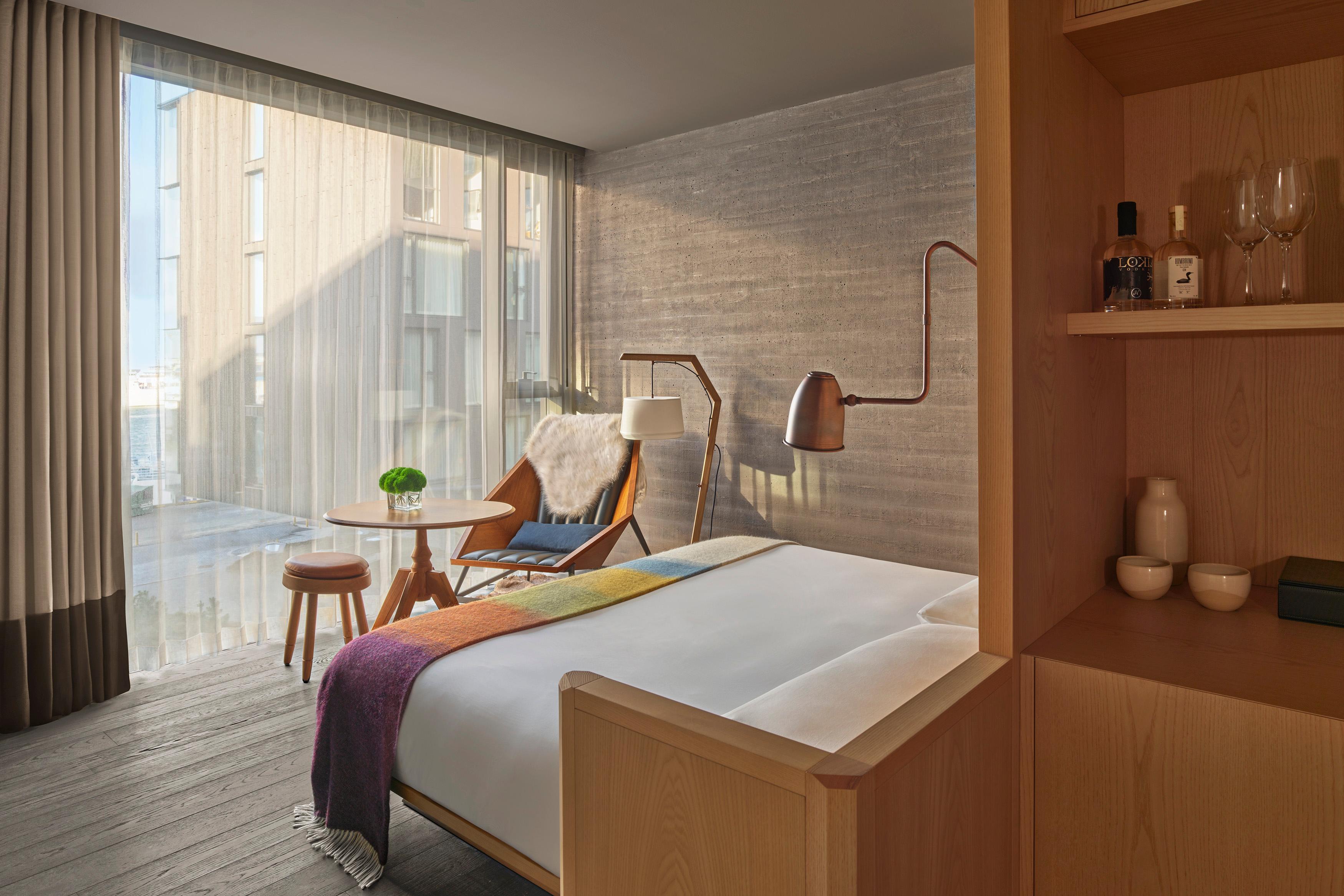 Deluxe Room with Ash Wood Paneling and Custom Furnishings