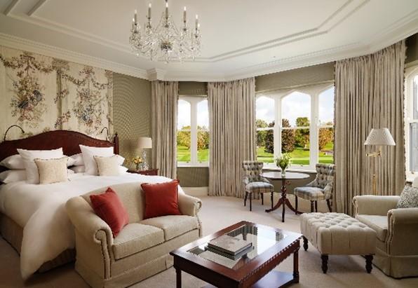 Dunraven Historic Stateroom with High Ceilings, Antique Fireplace, and Georgian Furnishings