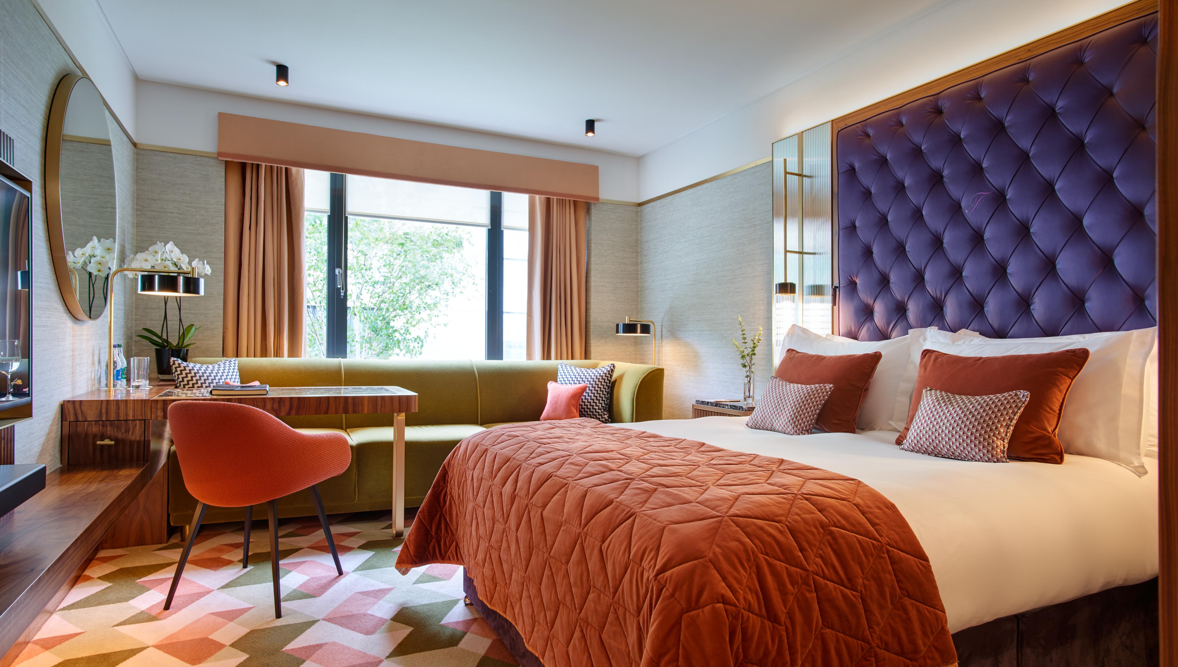 Signature Guestroom with Bold Color Accents, Marble Bathroom, and Irish Woolens