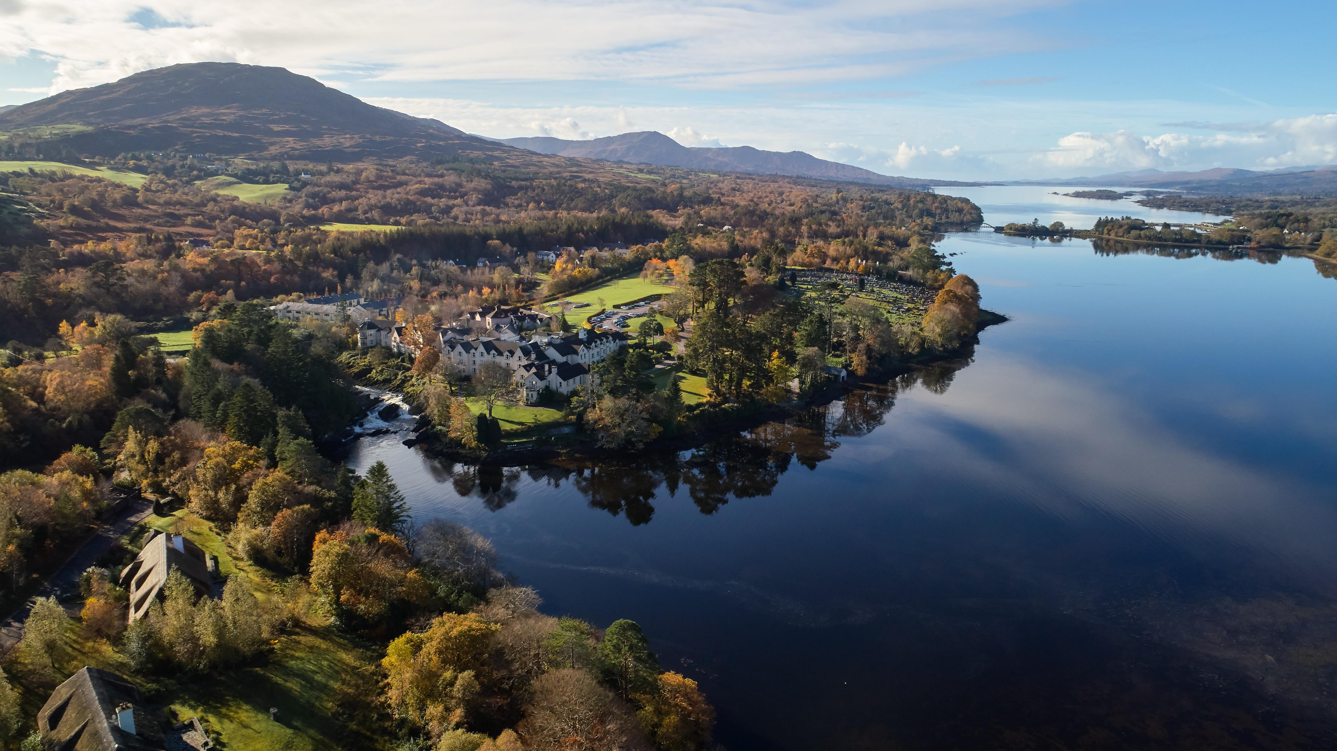 Aerial view of Sheen Falls Lodge set within 300 acres of Kerry woodlands and Kenmare Bay