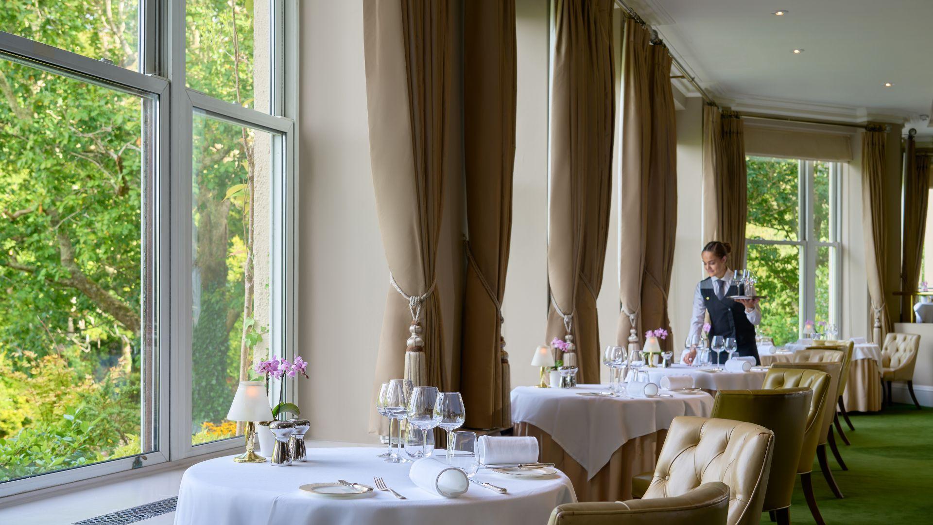 The Falls Restaurant offering gourmet fine dining with illuminated waterfall vistas
