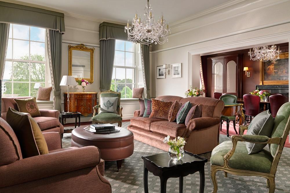 The Princess Grace Presidential Suite Salon with Fine Antiques and Park Vistas