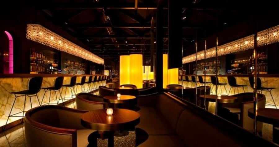 The Iconic Mirror Bar with Resident DJ & Intimate Cigar Lounge