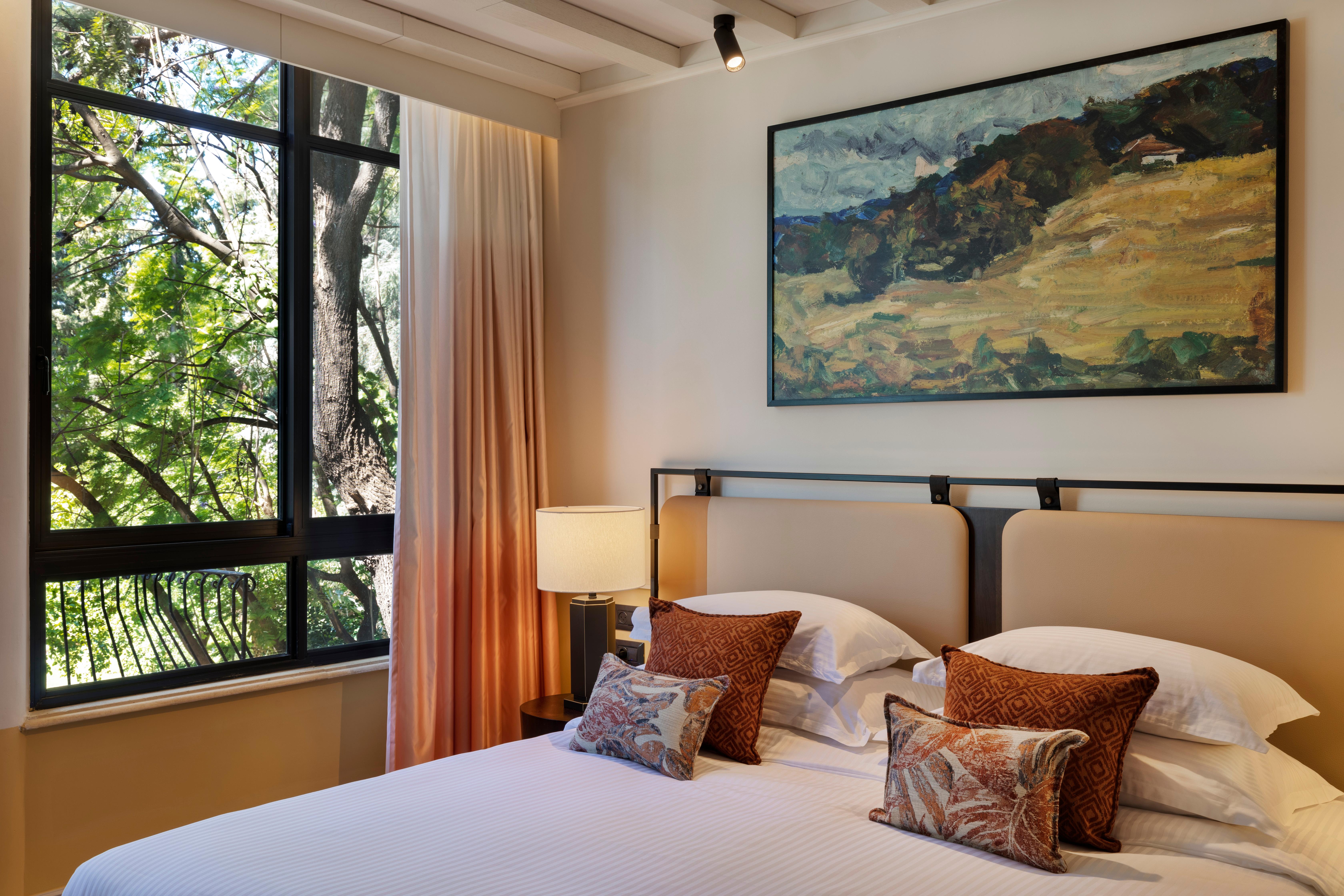 Mitzpe Hayamim Deluxe Room with Warm Woods & Natural Stones