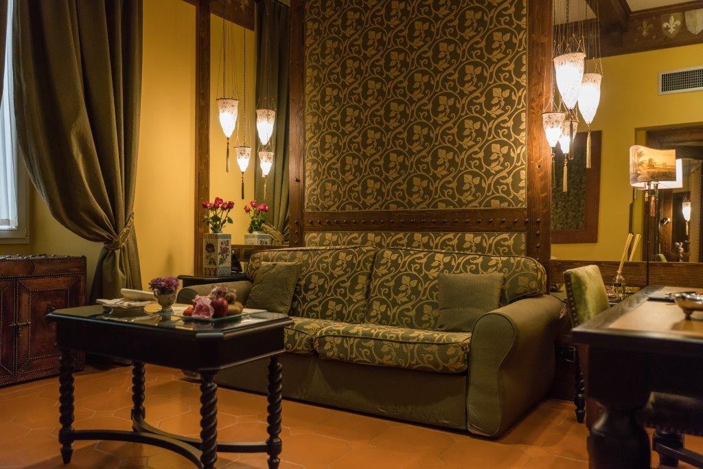 Sumptuous Tuscan-Style Suite with Period Furnishings, Exposed Beams, and Luxury Marble Bath