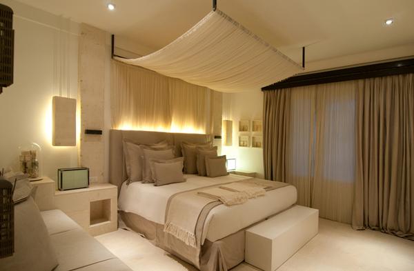 La Corte Bella Room Appointed in Hand-Hewn White Tufo Stone and Natural Earth Tones