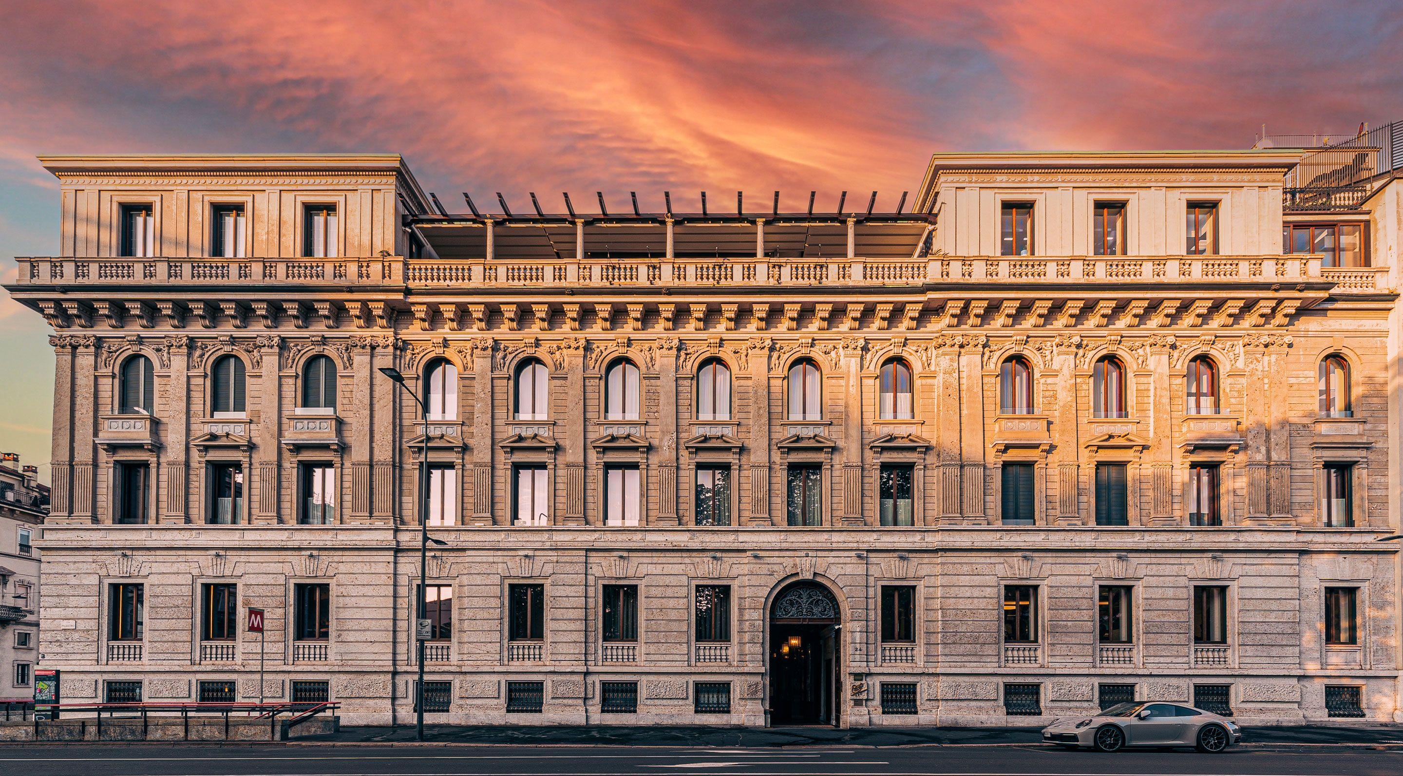 Neoclassical facade of Palazzo Bernasconi housing Casa Cipriani Milano