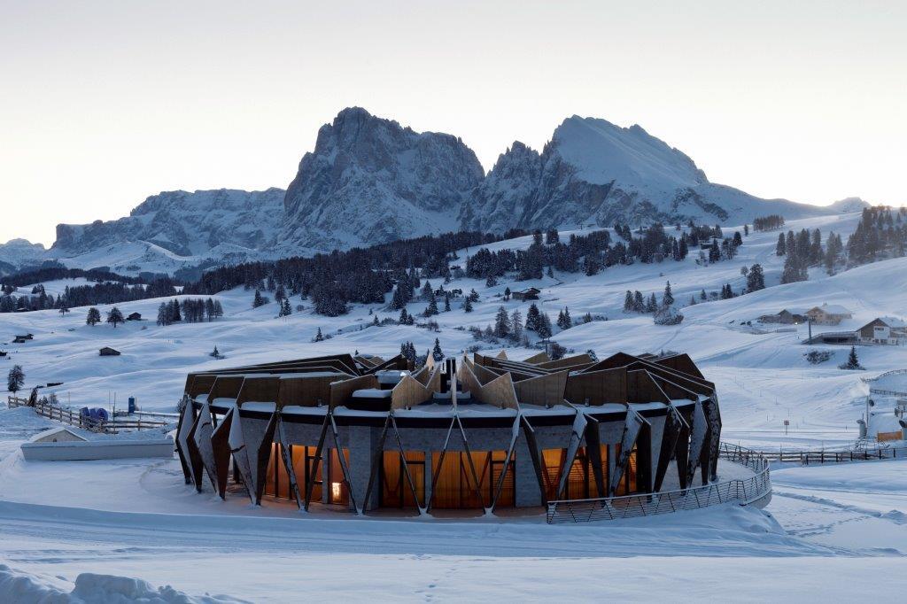 COMO Alpina Dolomites winter chalet exterior on Alpe di Siusi