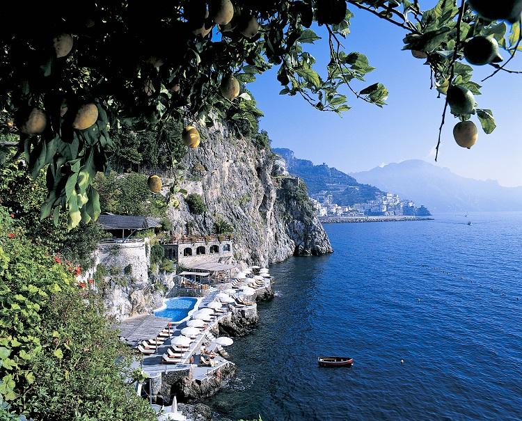 Heated seawater pool and private cliffside beach club