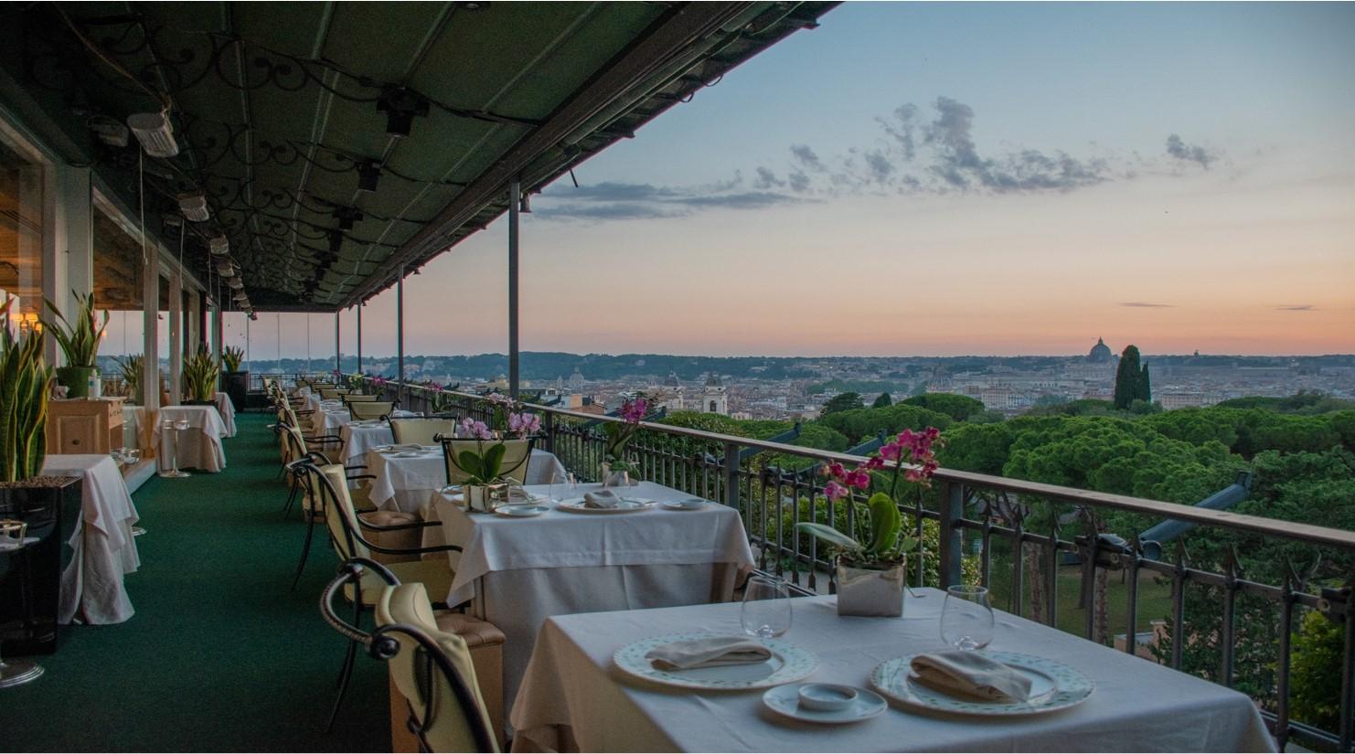 Mirabelle Rooftop Restaurant overlooking Rome at sunset
