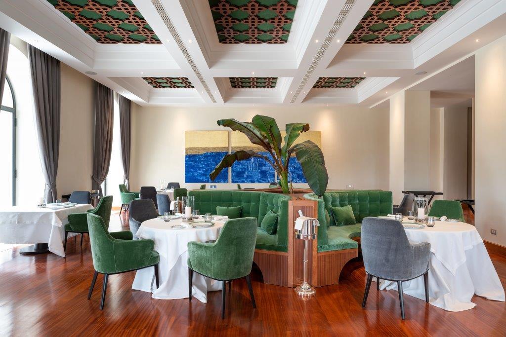Fine dining room at Principe di Belludia celebrating authentic Sicilian gastronomic artistry