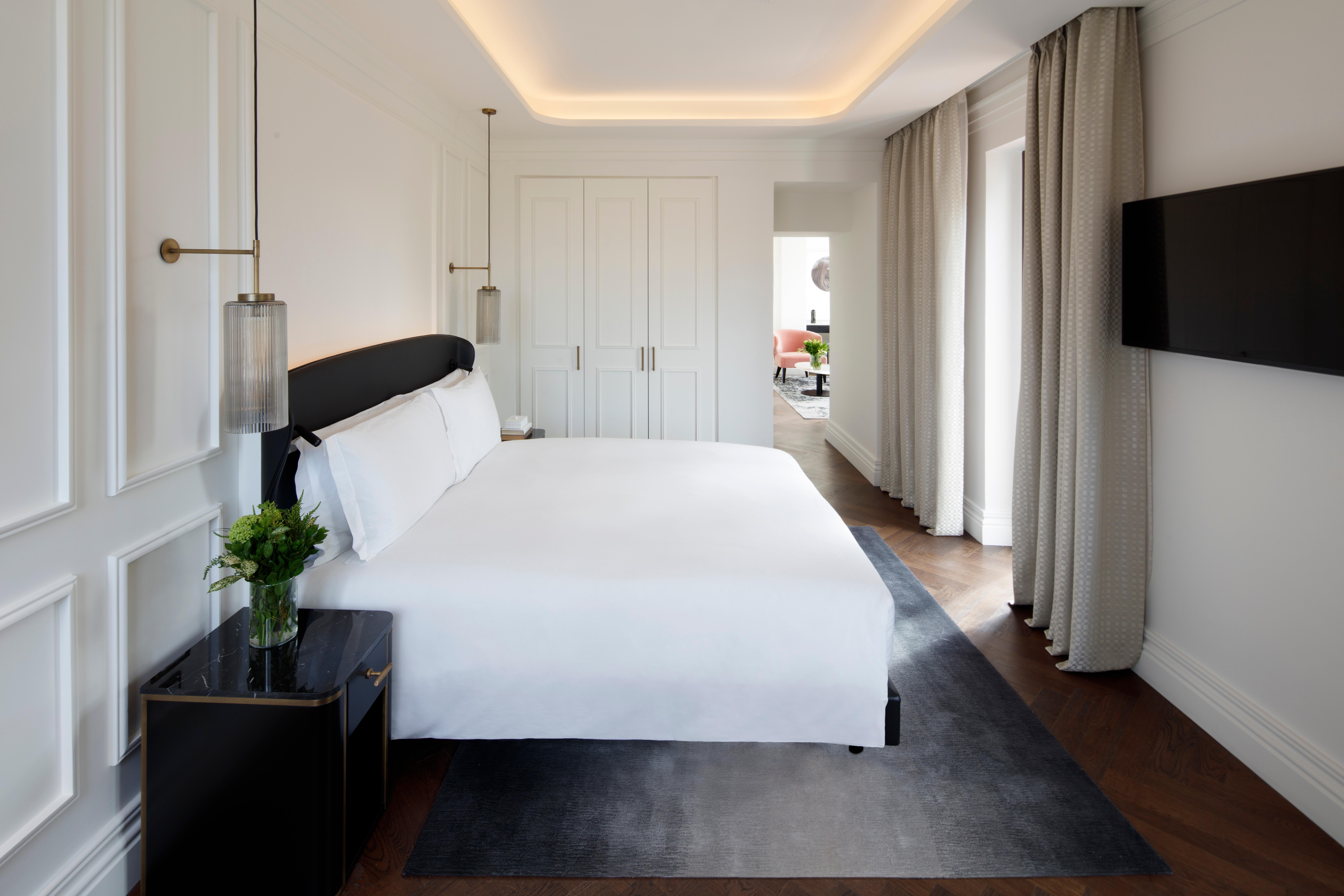 Ambasciatori Suite with refined contemporary decor, high ceilings, and separate parlor