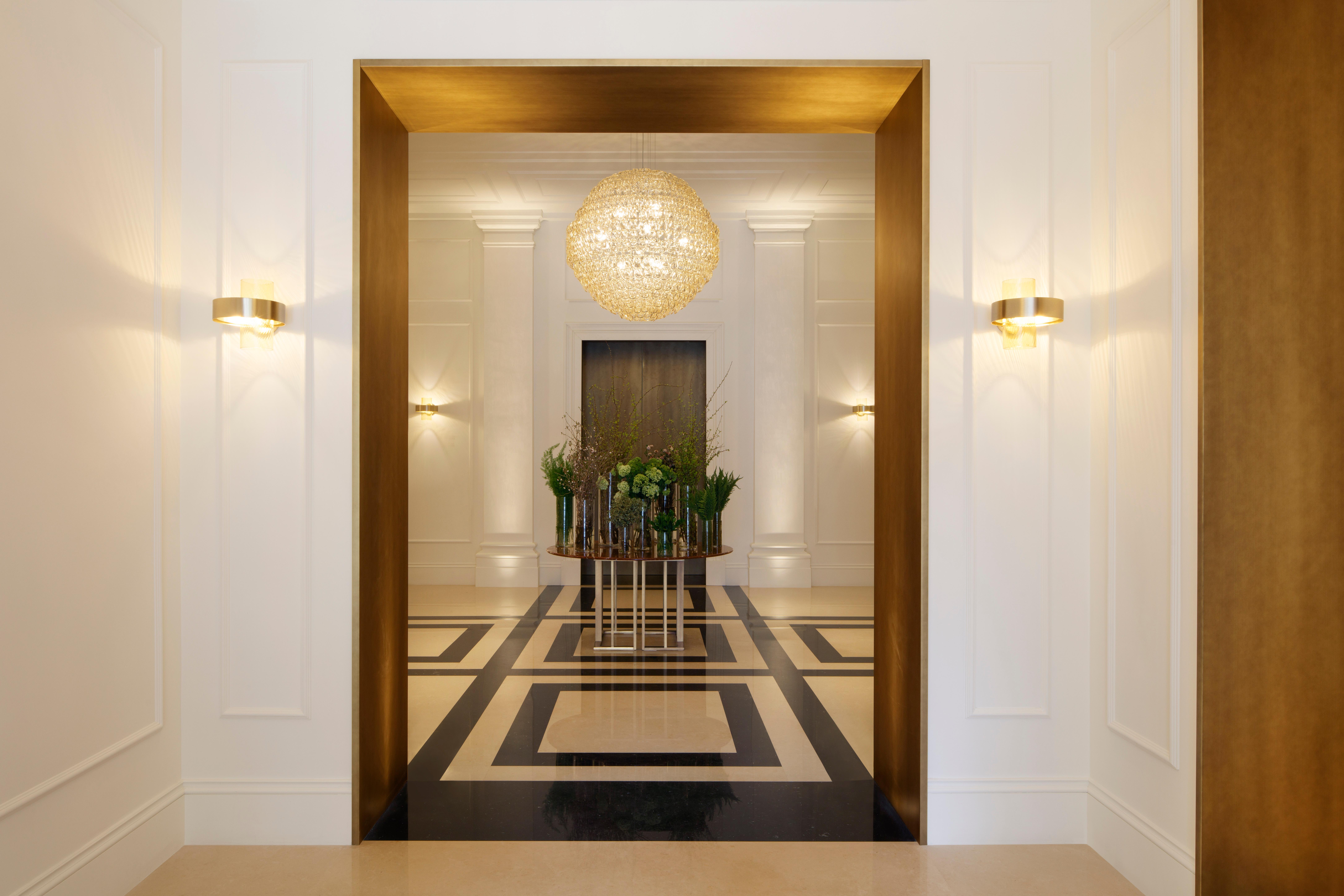 Grand Lobby lounge featuring marble columns, custom chandeliers, and La Dolce Vita elegance