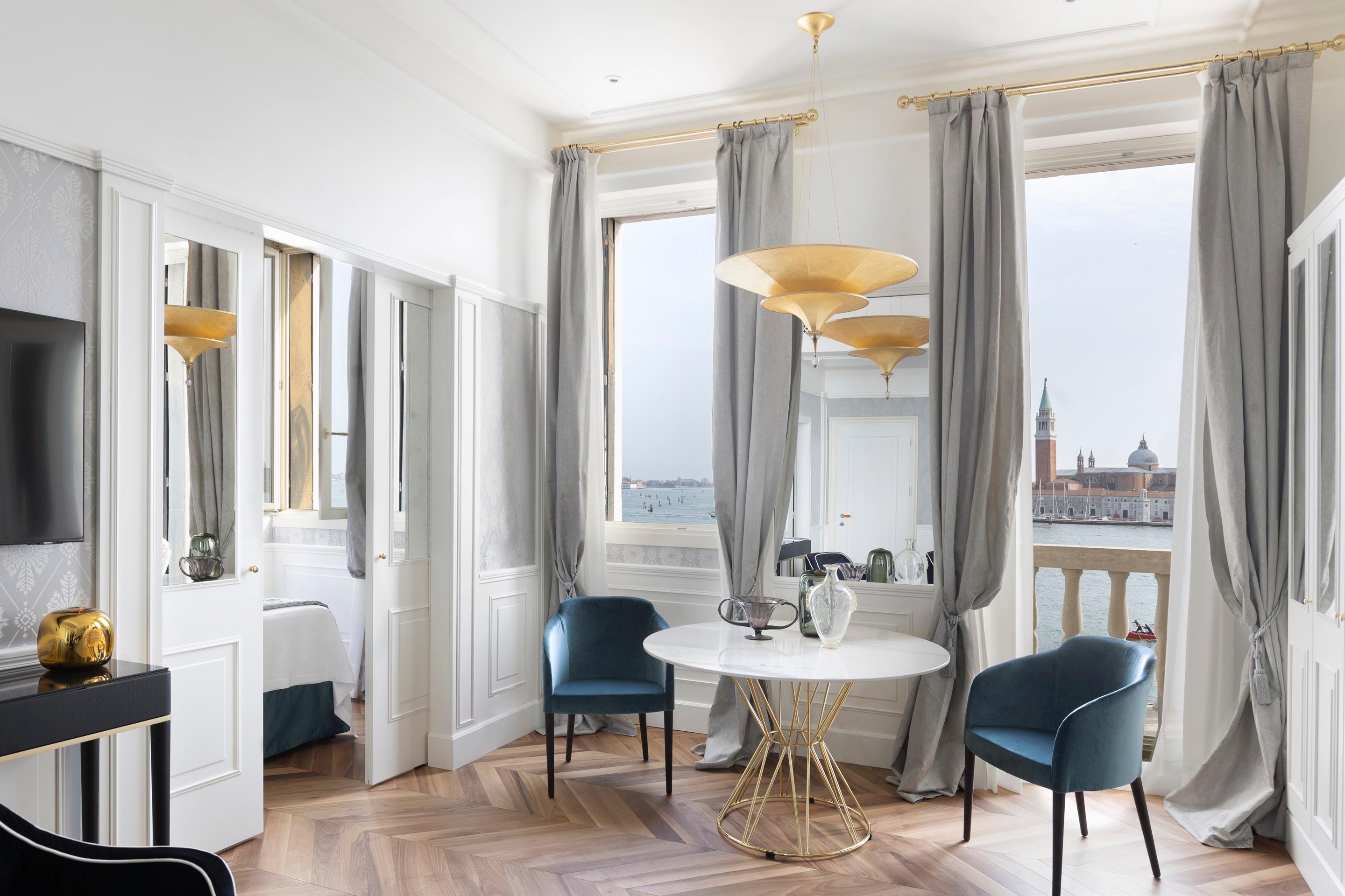Historic Borges Suite featuring Venetian silks, fine brocades, and private lagoon balcony