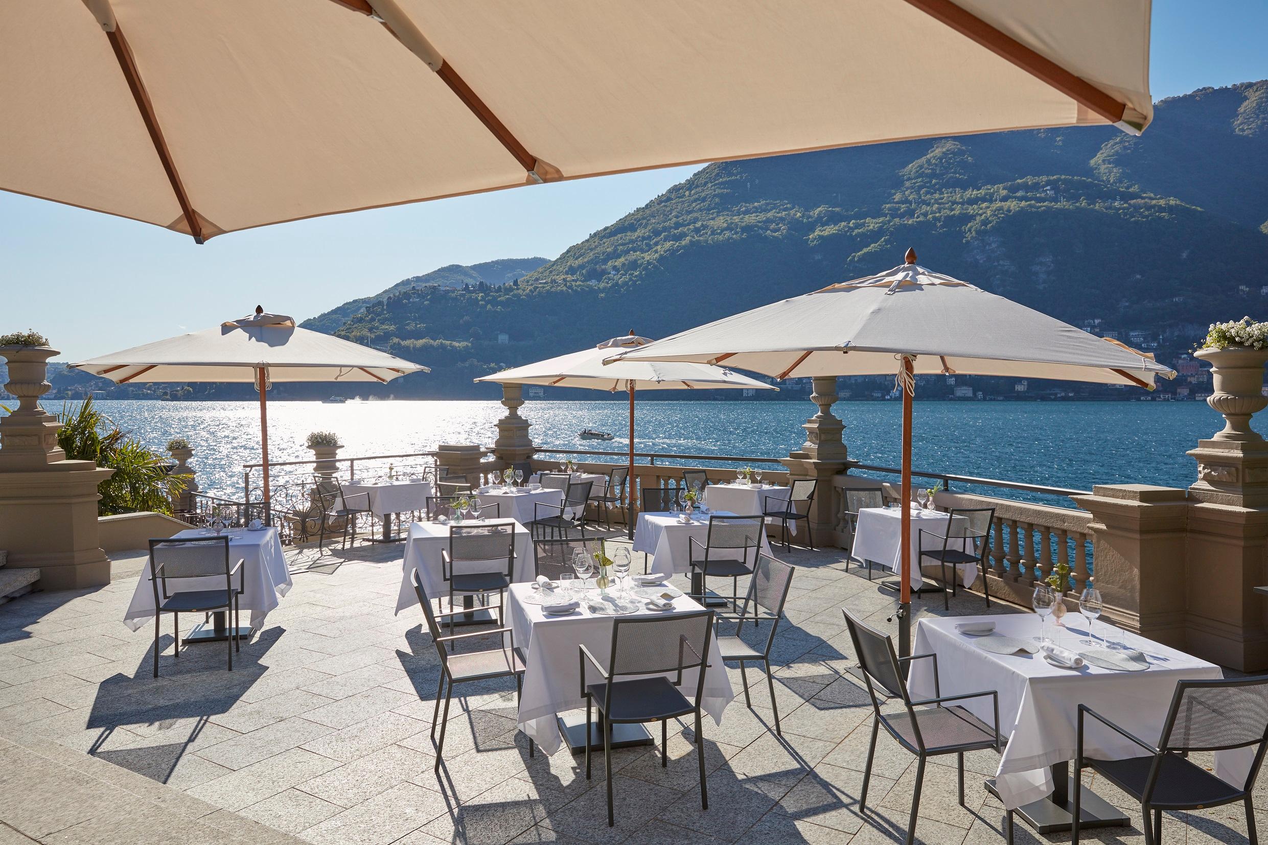 Al fresco waterfront dining at L'Aria featuring Mediterranean haute cuisine and lake views