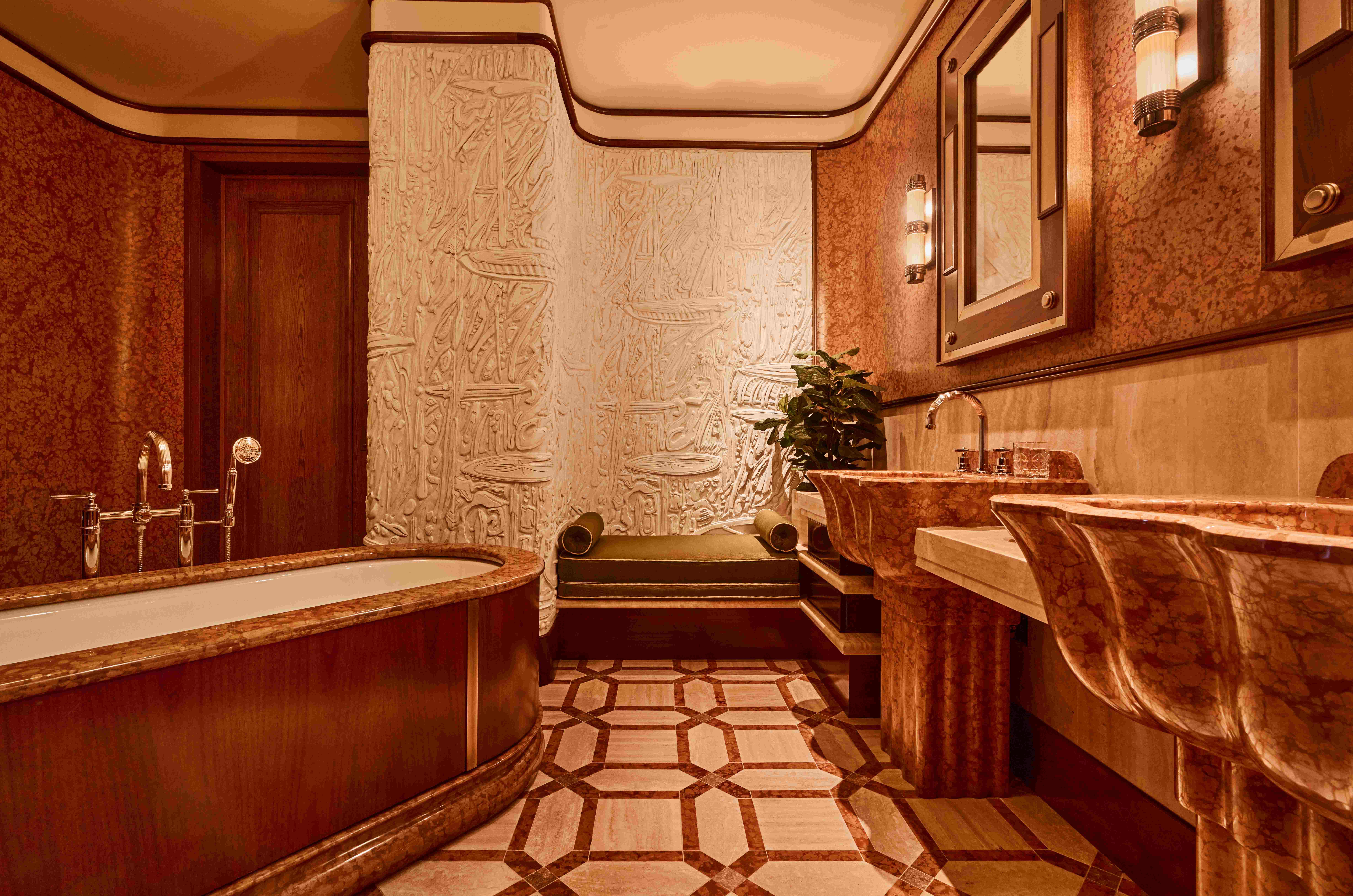 Italian marble bathroom with freestanding soaking tub in Obelisco Suite