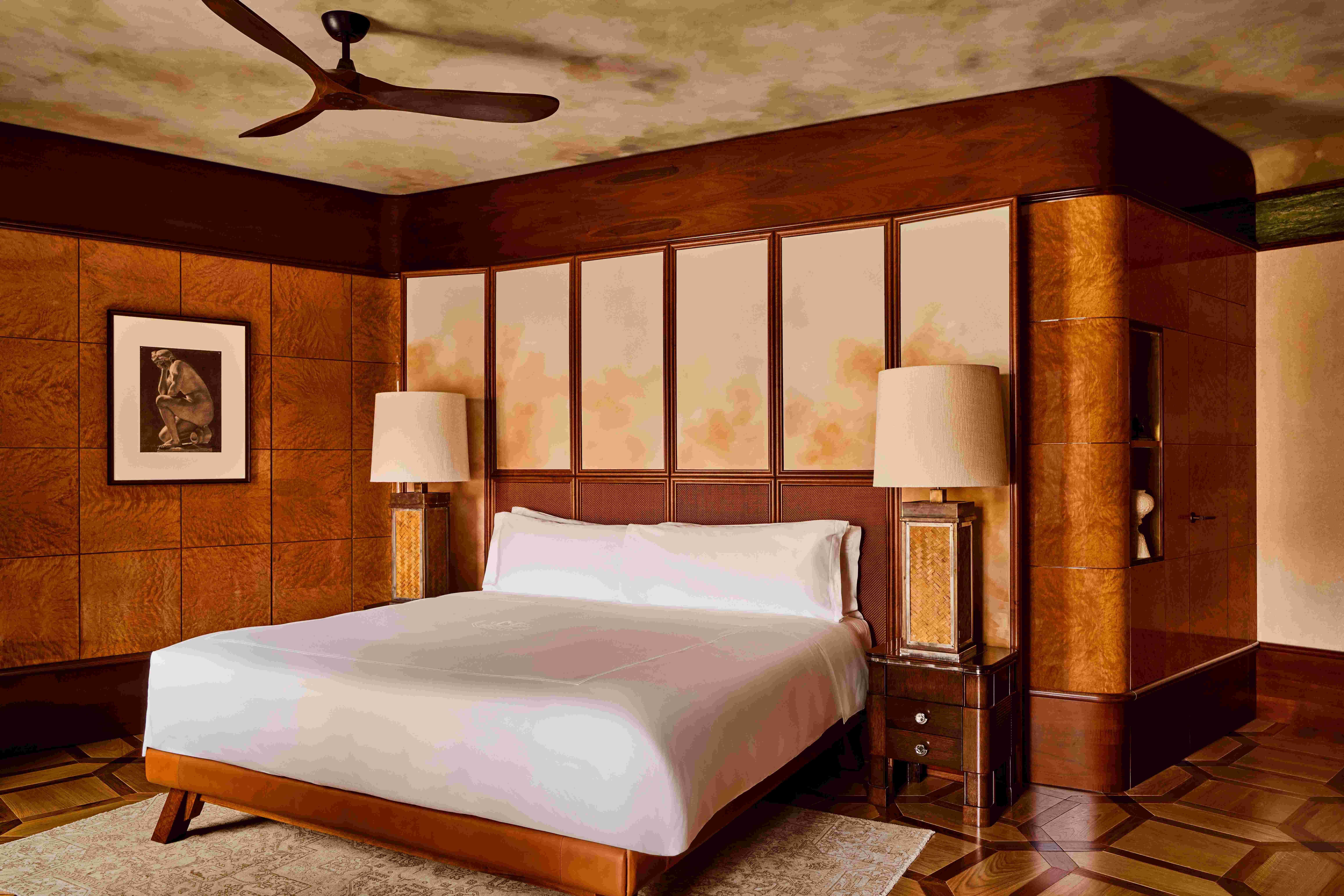 Master bedroom with bespoke fluted woodwork and custom velvets