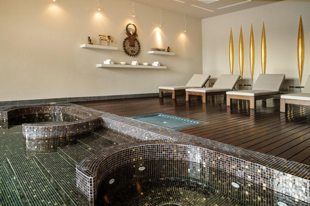 Precise Tale Poggio Alla Sala serene spa retreat featuring heated indoor pool with vaulted architecture
