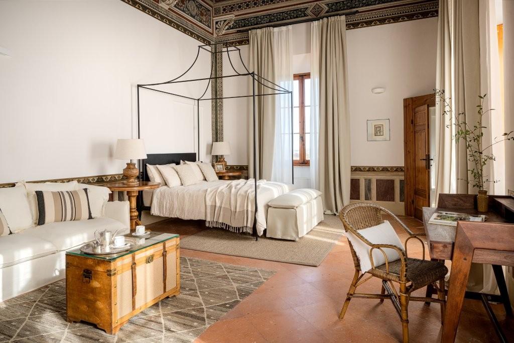 Pietro Master Suite with authentic restored 18th-century frescoes and panoramic views of Tuscan countryside