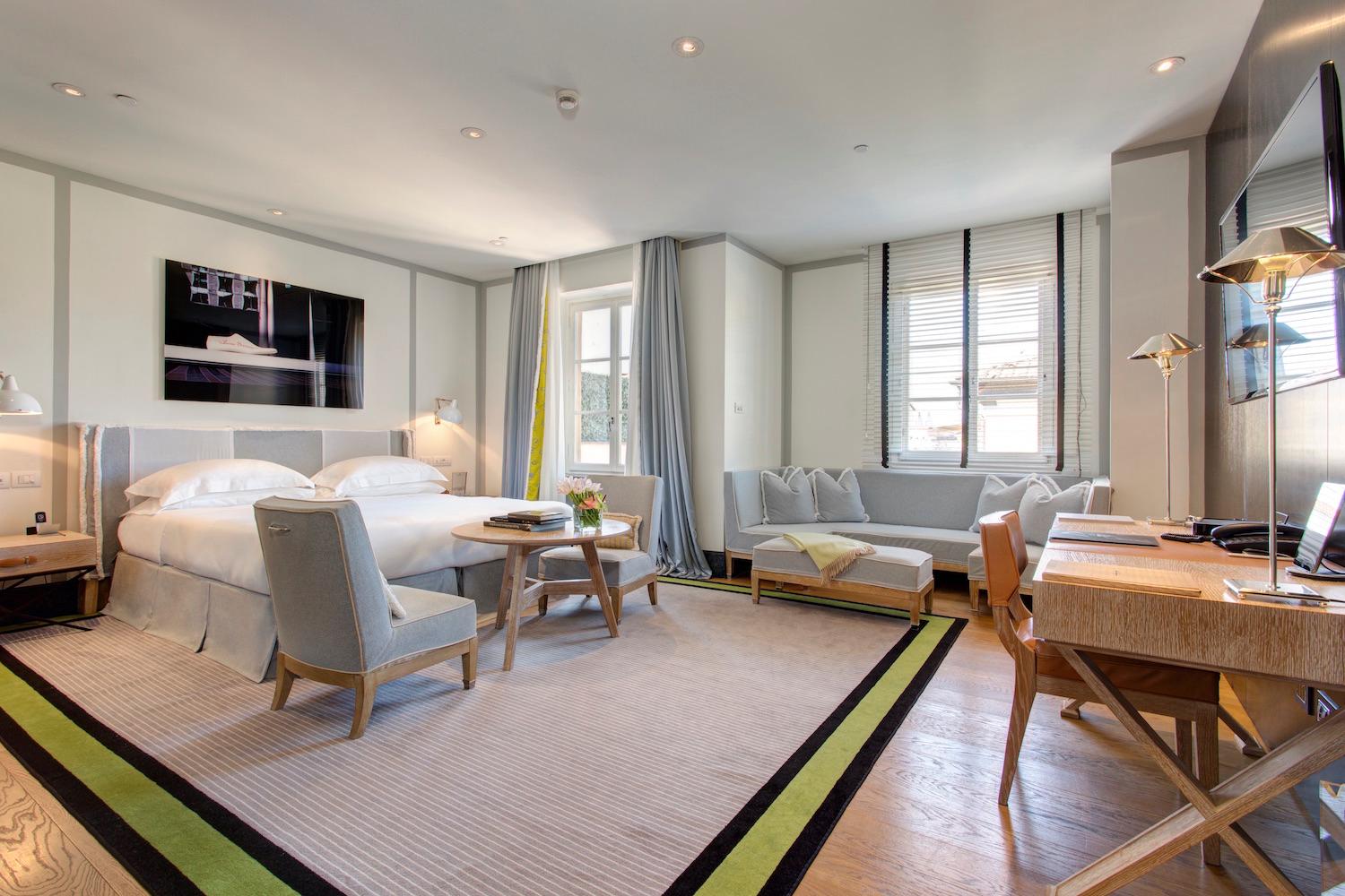 Portrait Roma Penthouse Suite salon with bespoke Italian furnishings and couture art