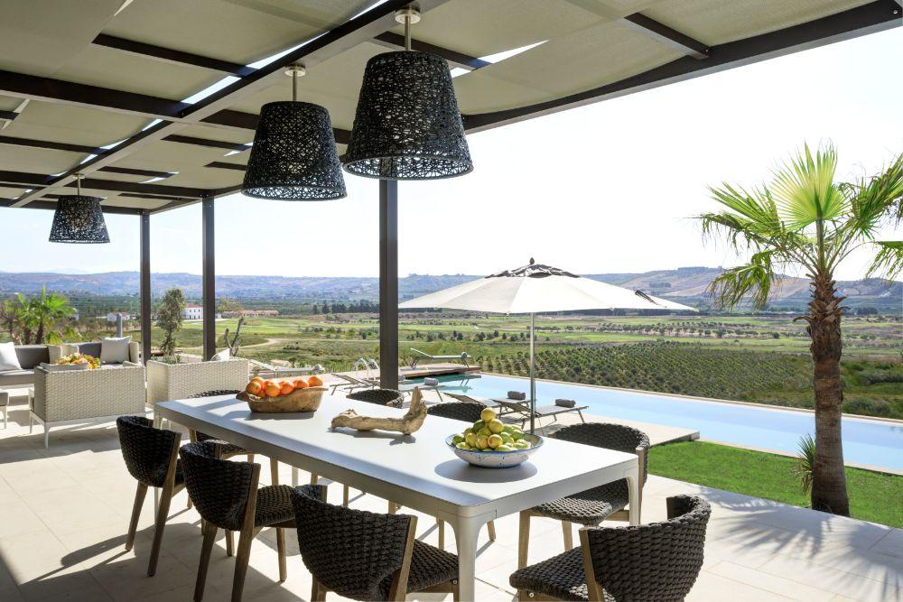 Furnished outdoor pergola dining terrace and barbecue with panoramic Mediterranean vistas