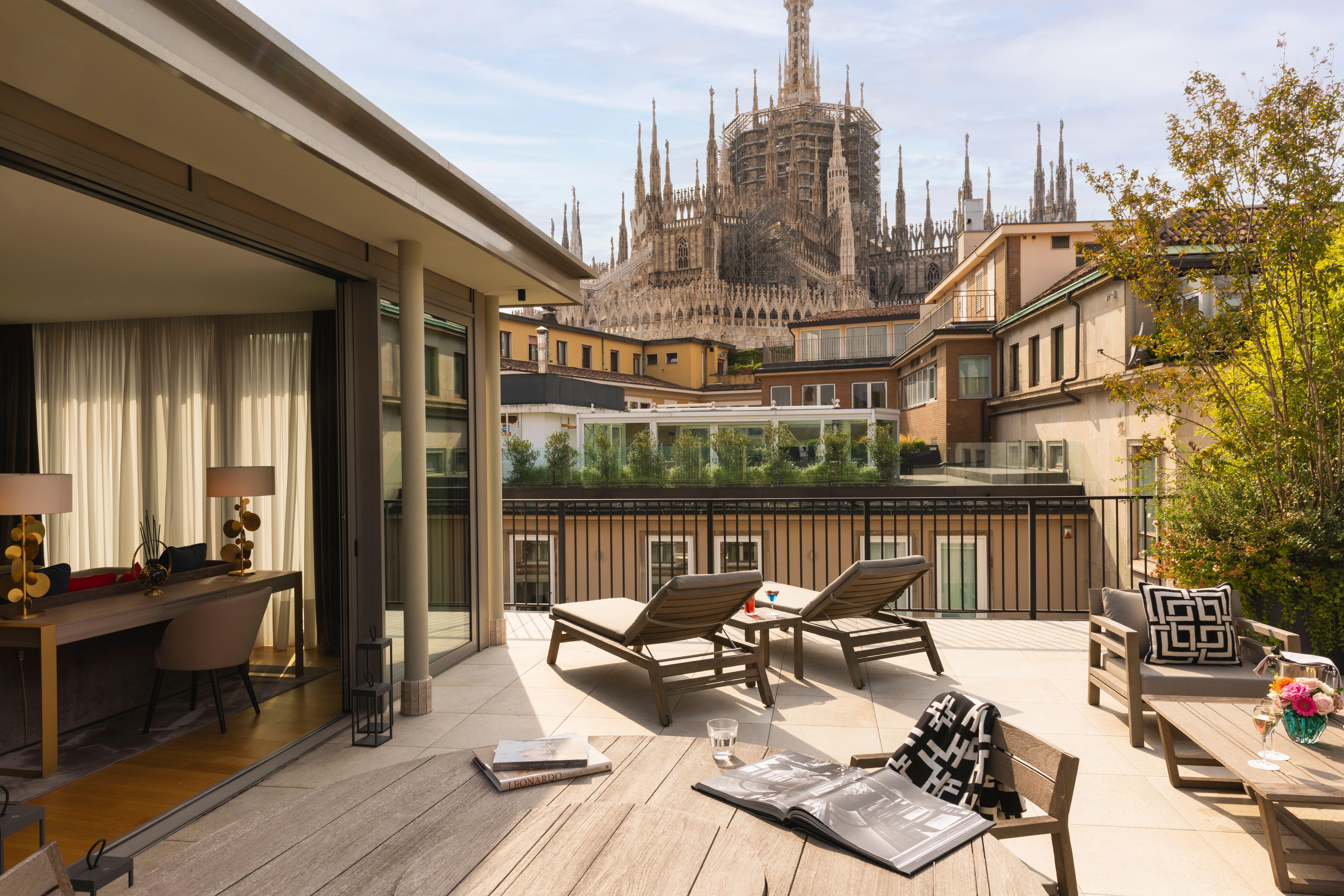 Duomo Luxury Apartments private panoramic rooftop terrace with direct views of Duomo spires