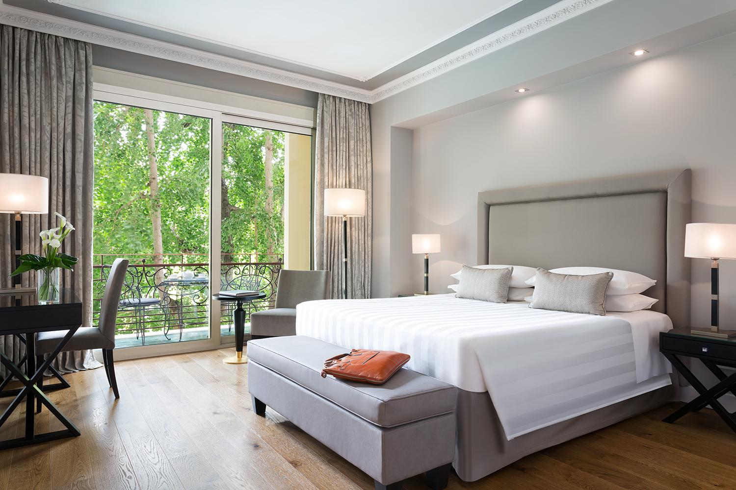 Deluxe guestroom blending classic heritage with modern Italian comforts