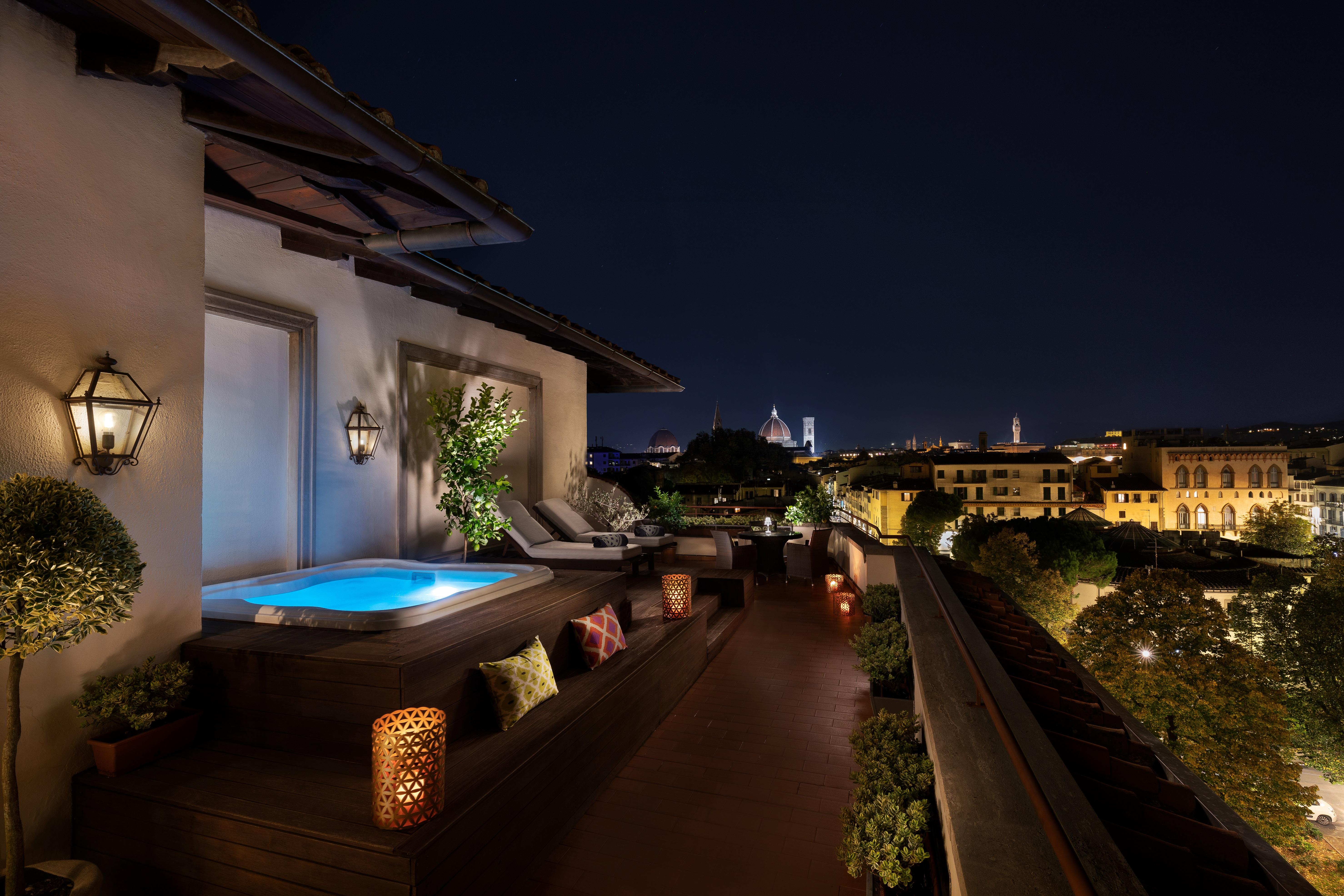 Florence Suite furnished terrace overlooking city rooftops and Duomo