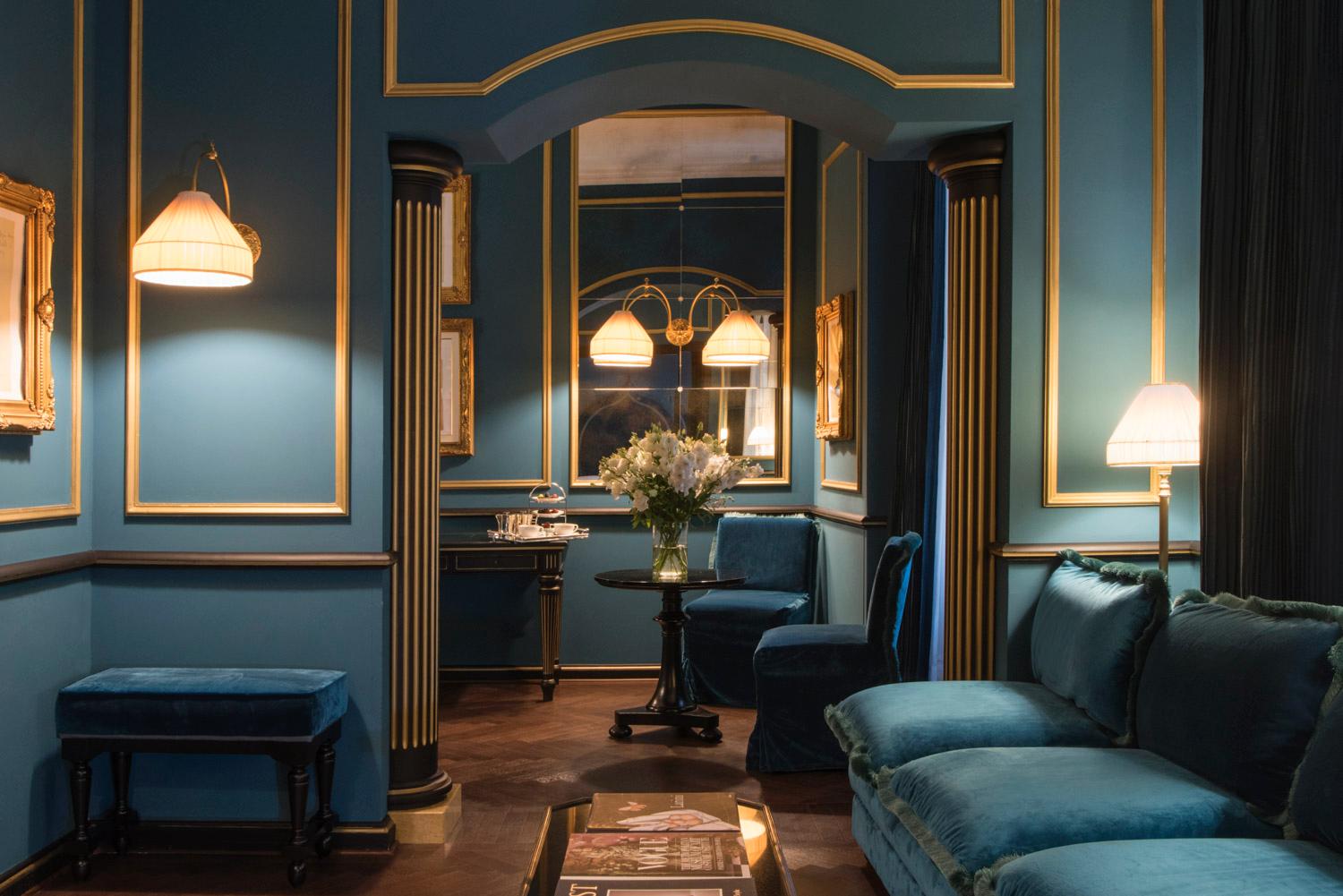 Splendid Heritage Suite featuring rich velvet drapery and Venetian styling