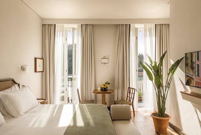 Sea View and Balcony Suite bedroom with mid-century Italian decor