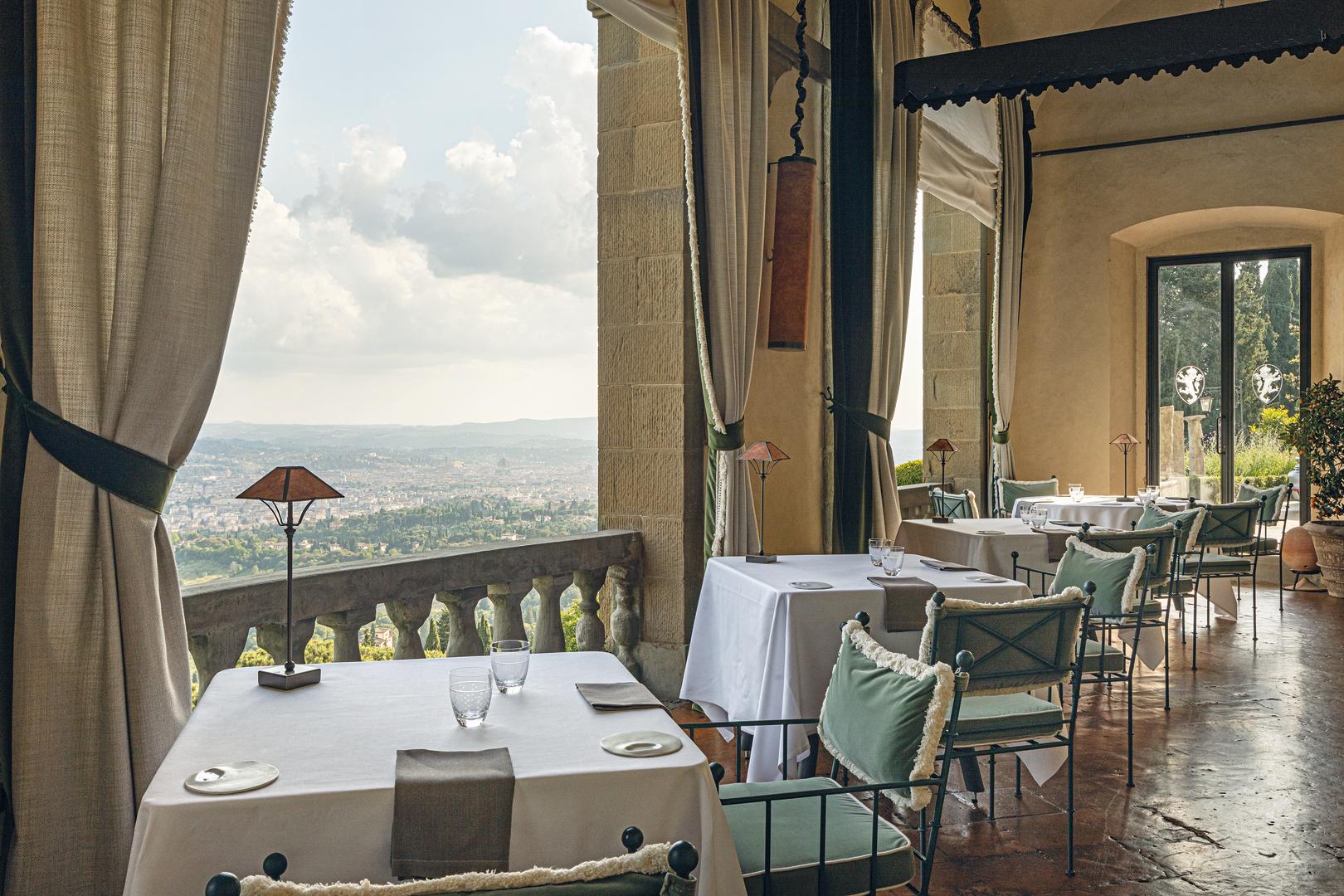 Fine dining along the arched Renaissance loggia facing Florence