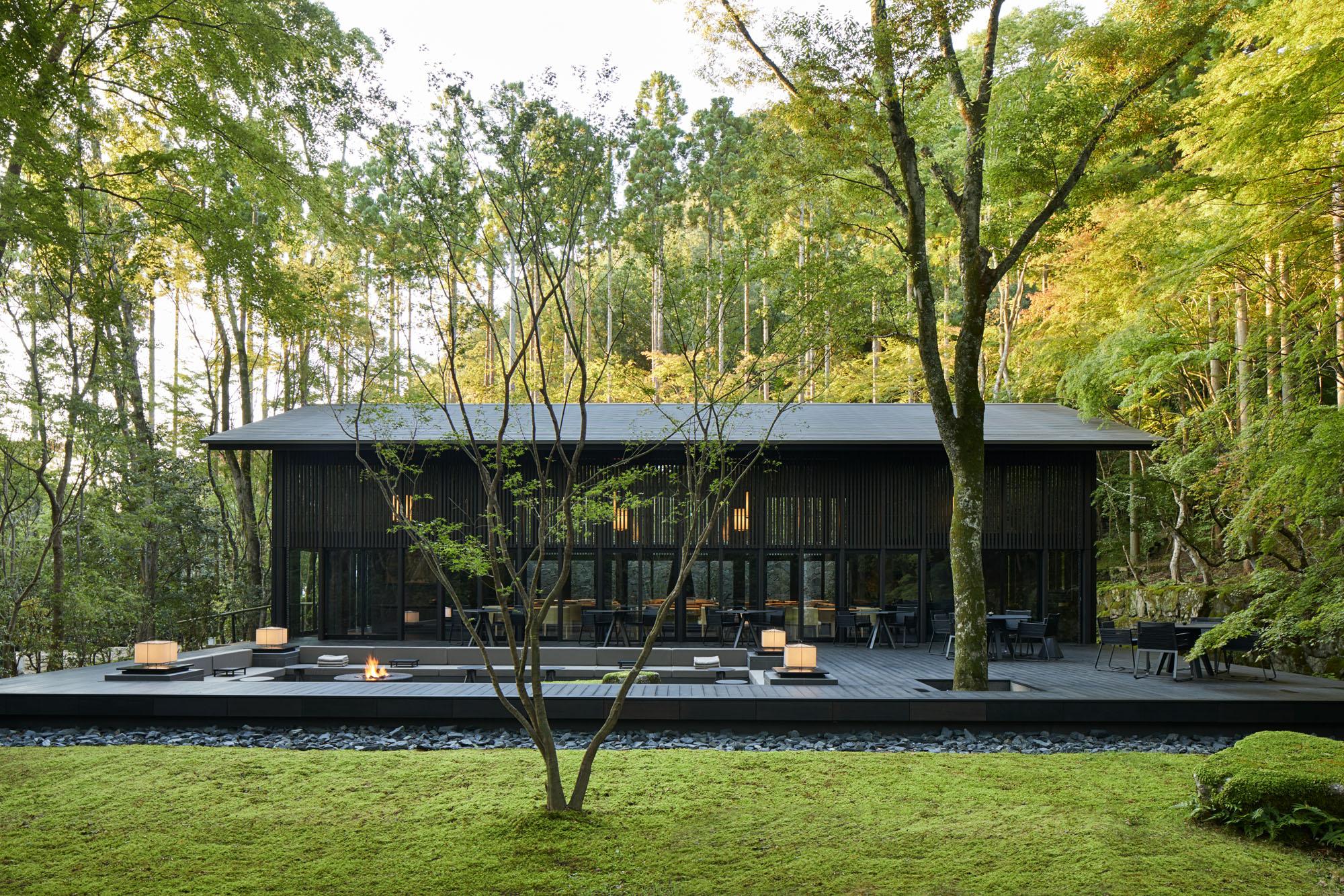 The Living Pavilion by Aman with Open-Air Terrace Framing Forest Vistas