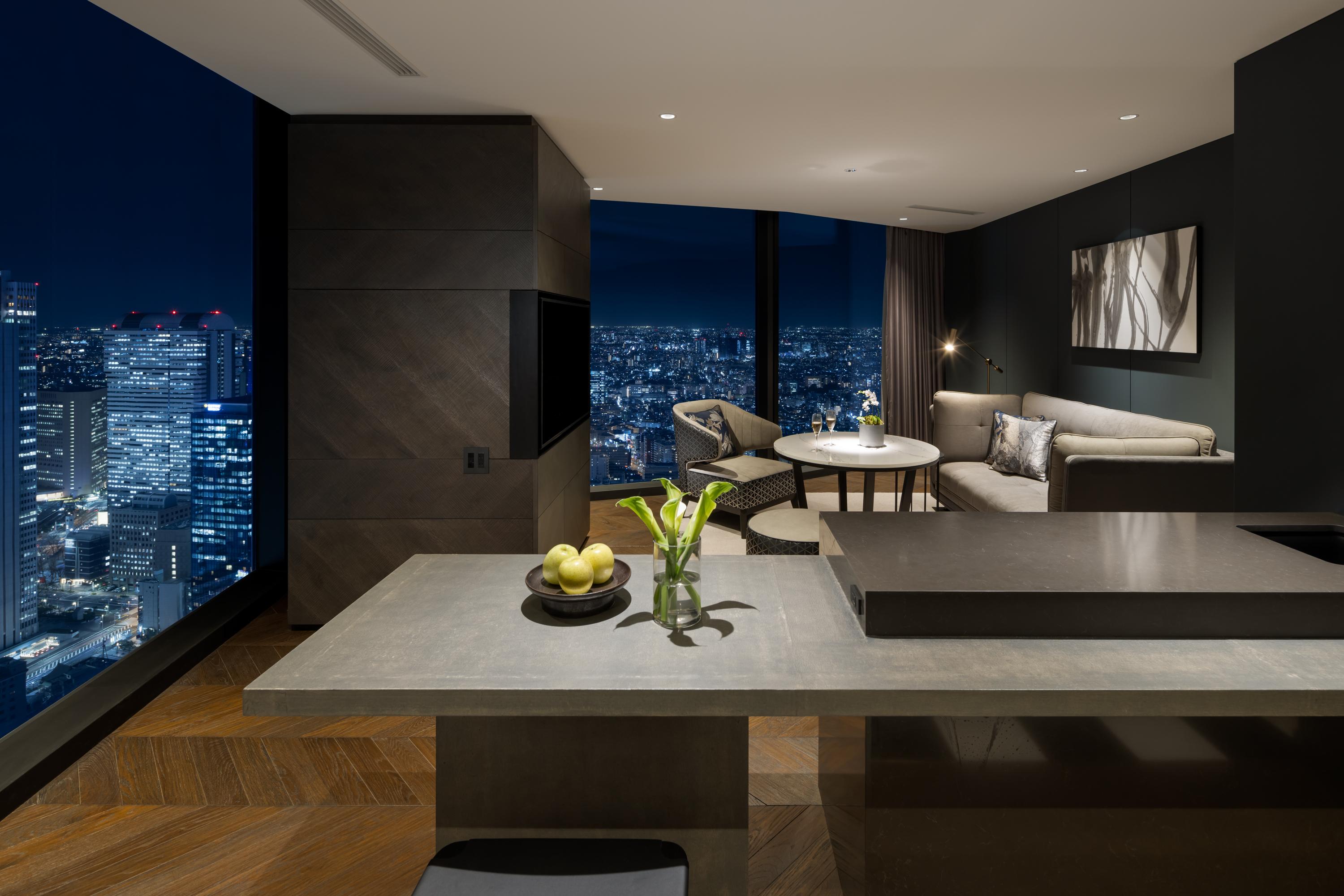 Deluxe Suite Living Salon with Sweeping Seven-Meter Night Skyline Windows