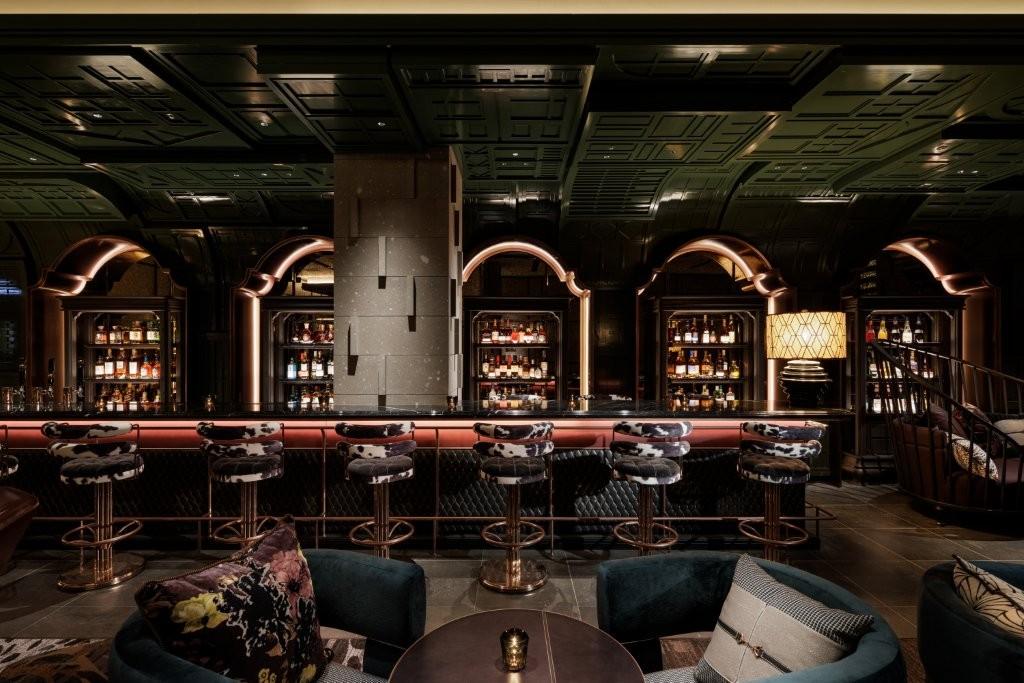 The Bar Lounge with Centerpiece Copper Fireplace
