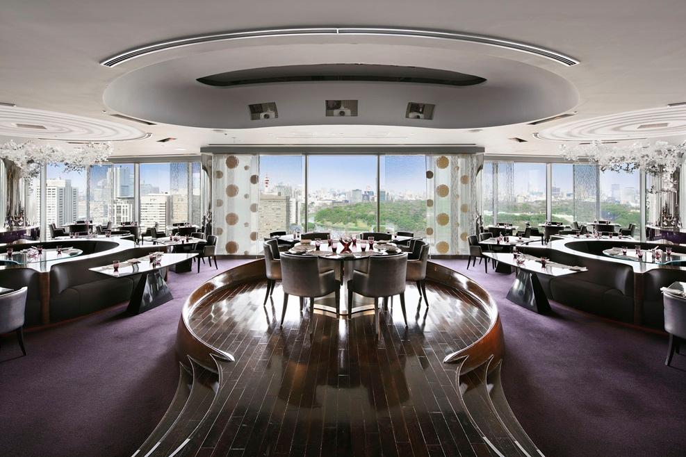 Peter Restaurant on 24th Floor with Dramatic Chrome Decor and Skyline Views