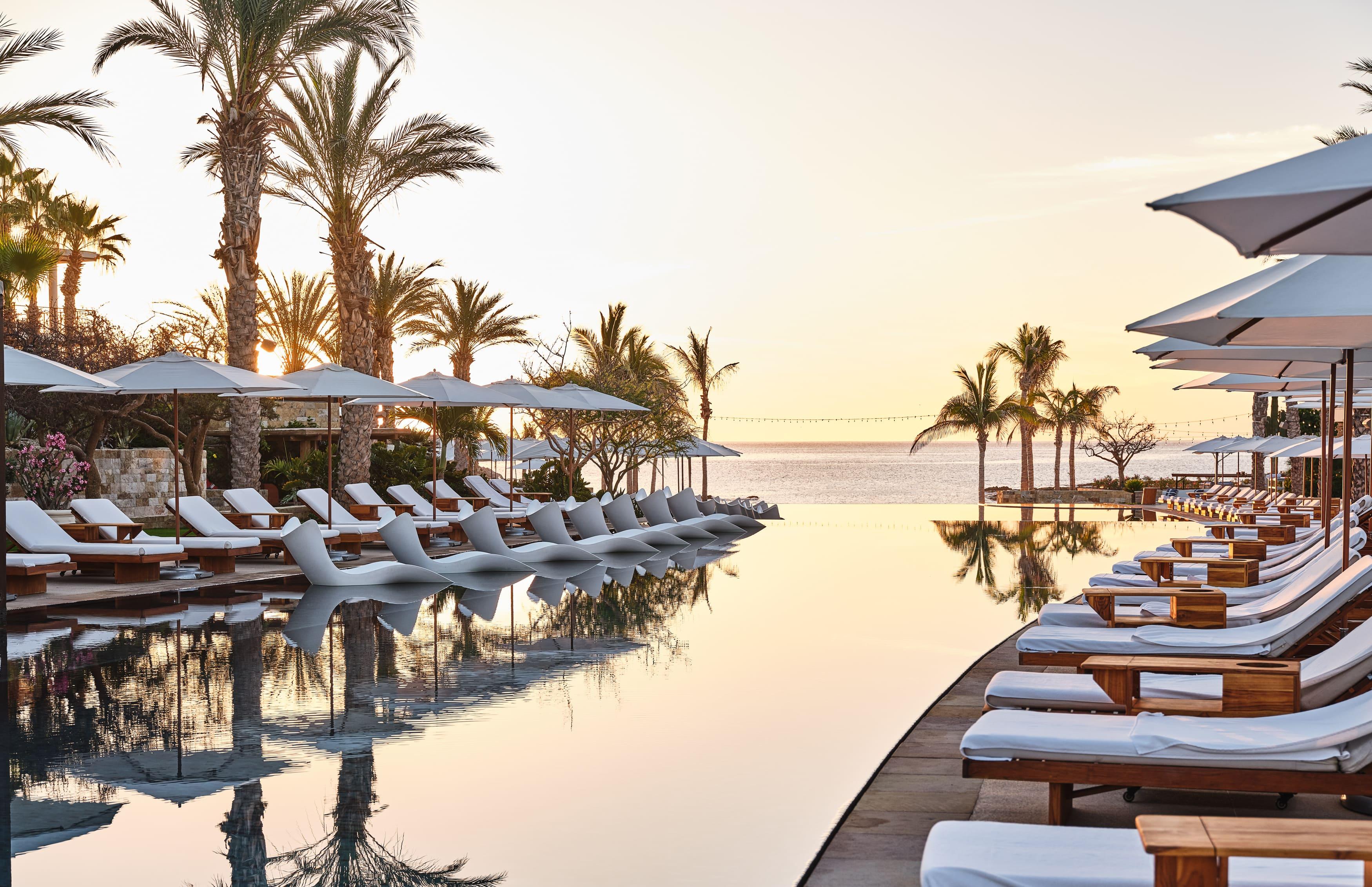 Multi-tiered swimming pool with private cabanas
