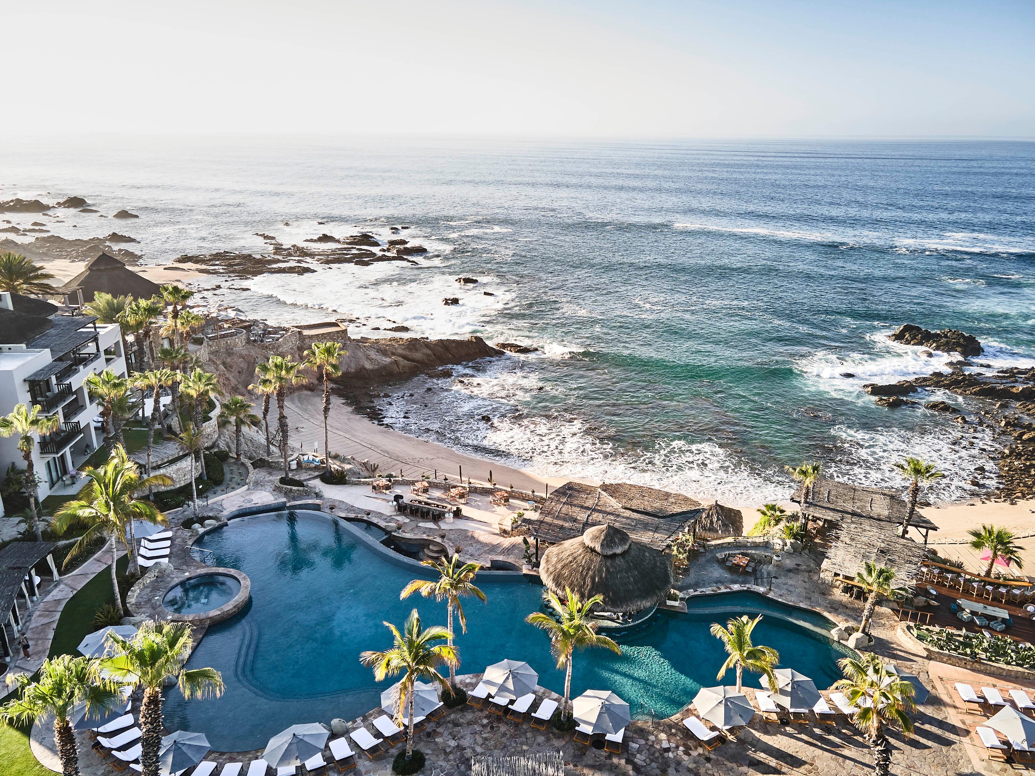 La Palapa pool and private oceanfront cabanas