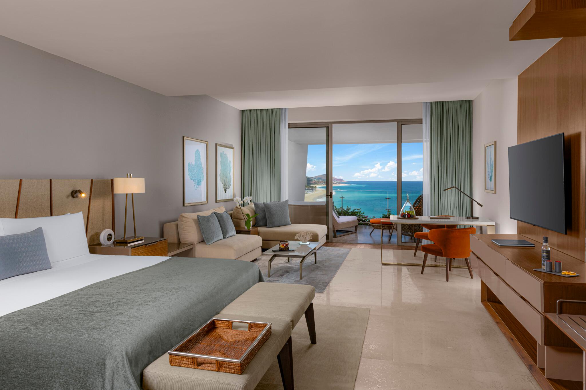 Ambassador Ocean View Suite with expansive terrace and daybed