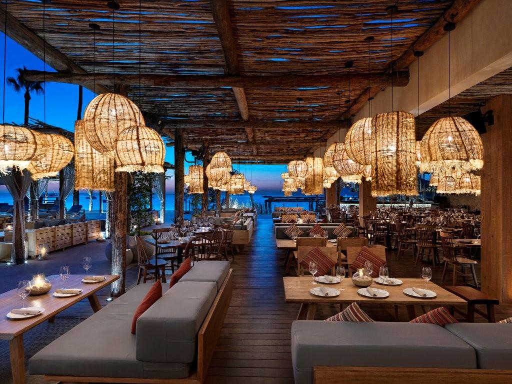 Taboo Beach Club oceanfront daybeds and vibrant day-to-night Mediterranean party atmosphere