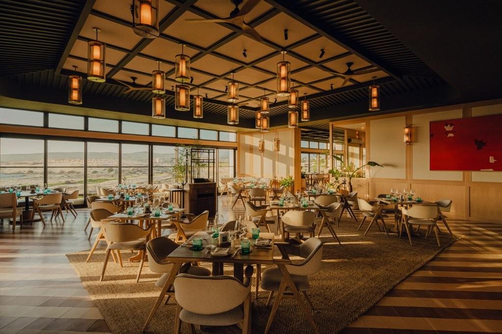MUNA open-air rooftop restaurant and M Bar with panoramic Pacific sunset views