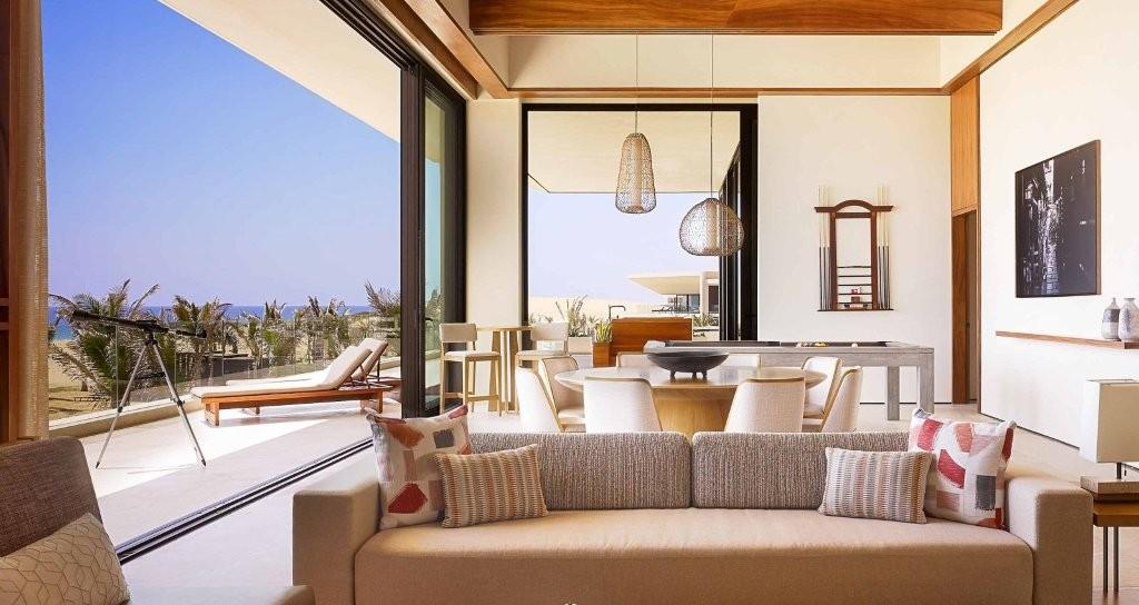 Nobu Suite oceanfront living terrace with teak Japanese loungers and private plunge pool