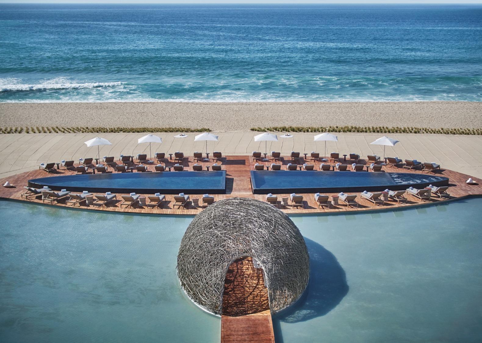 Oceanfront beach pools and Nidito daybeds at Viceroy Los Cabos