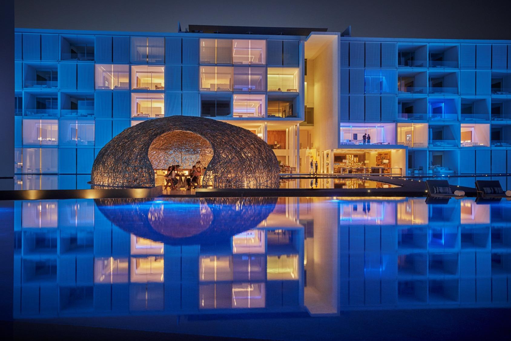 Viceroy Los Cabos floating Nido restaurant illuminated at night